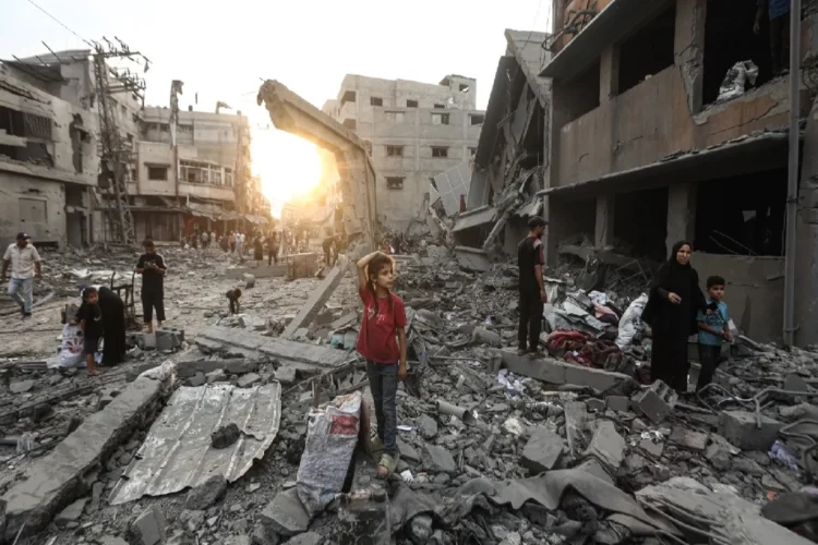 Israeli strikes kill dozens in Gaza, target cafe, school, and aid sites