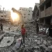 Israeli strikes kill dozens in Gaza, target cafe, school, and aid sites