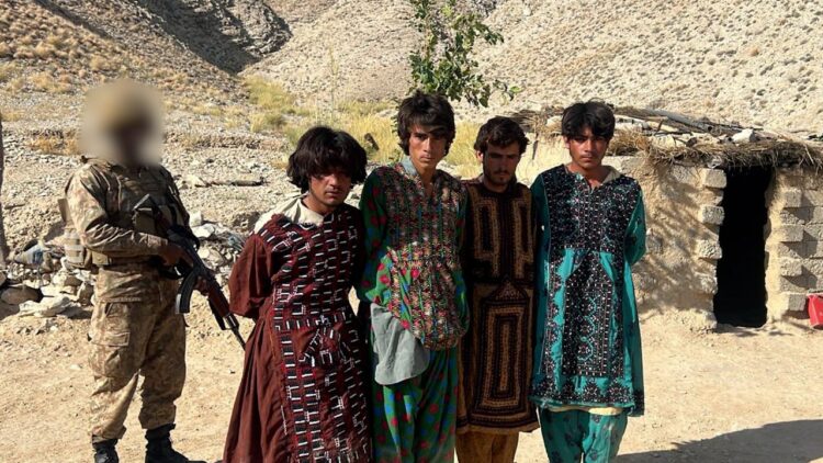 Militants caught fleeing in women’s disguise