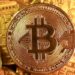 Bitcoin Slumps as Trade War Fears Push Investors to Safer Assets